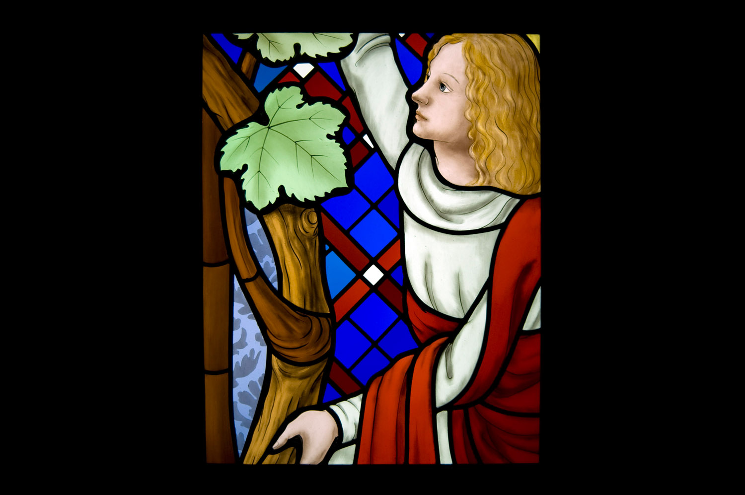 リラベル教会ステンドグラス詳細写真「信者とぶどう」